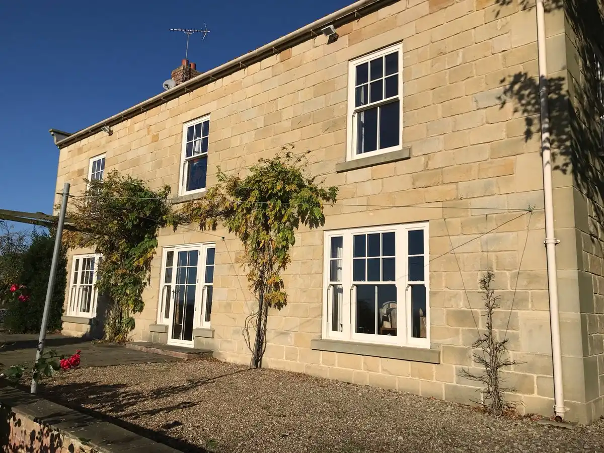 sliding sash window on a brick house in chatteris 